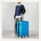 Amazon Basics Hardside Medium Checked Suitcase – Light Blue / Medium Checked – product detail